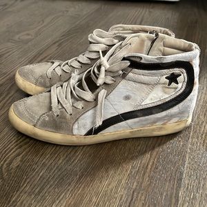 Very very worn in golden goose. They’ll need repair, but worth the investment.